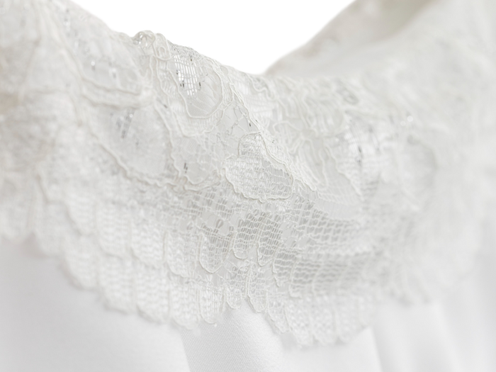 Close up of the lace trim on the white ruffle skirt
