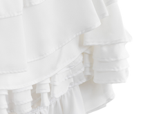 Layered white ruffles on the wedding dress mini skirt