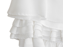 White ruffle mini skirt, fabric and hem detail