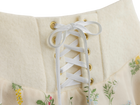 White lace-up front detail on the floral mini skirt
