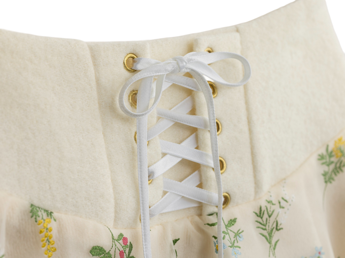 White lace-up front detail on the floral mini skirt
