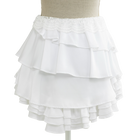 Side view of the tiered white ruffle mini skirt