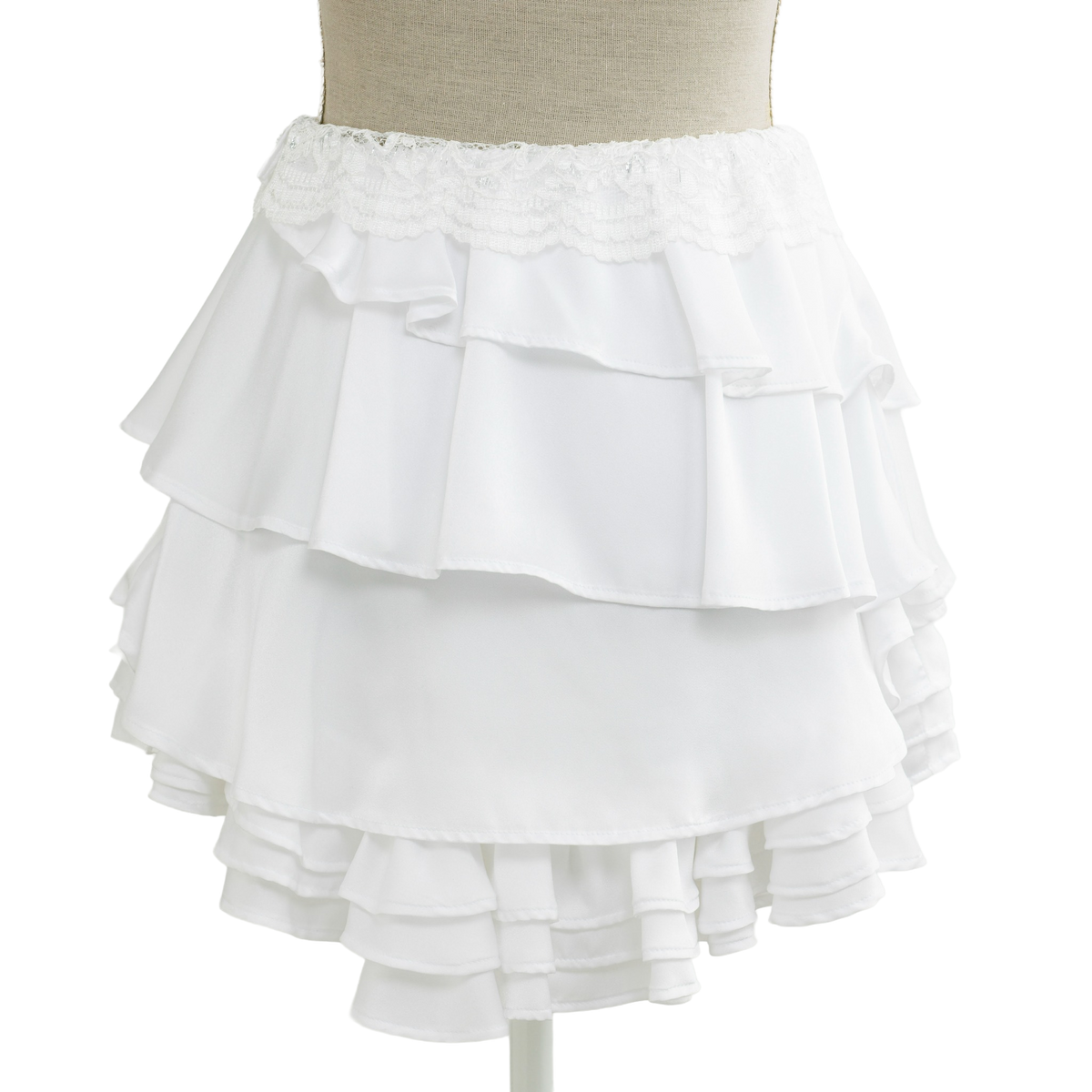 Side view of the tiered white ruffle mini skirt