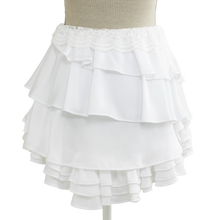 Side view of the tiered white ruffle mini skirt