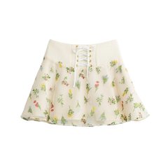 Cream floral mini skirt with a lace-up waist, front view